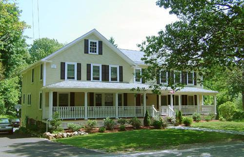 New exterior view of Bonchak residence in Bedford, MA