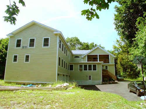 New exterior view of Bonchak residence in Bedford, MA