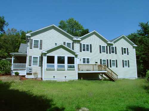 New exterior view of Bonchak residence in Bedford, MA