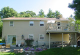 Back view of Orioala residence in Dracut, MA